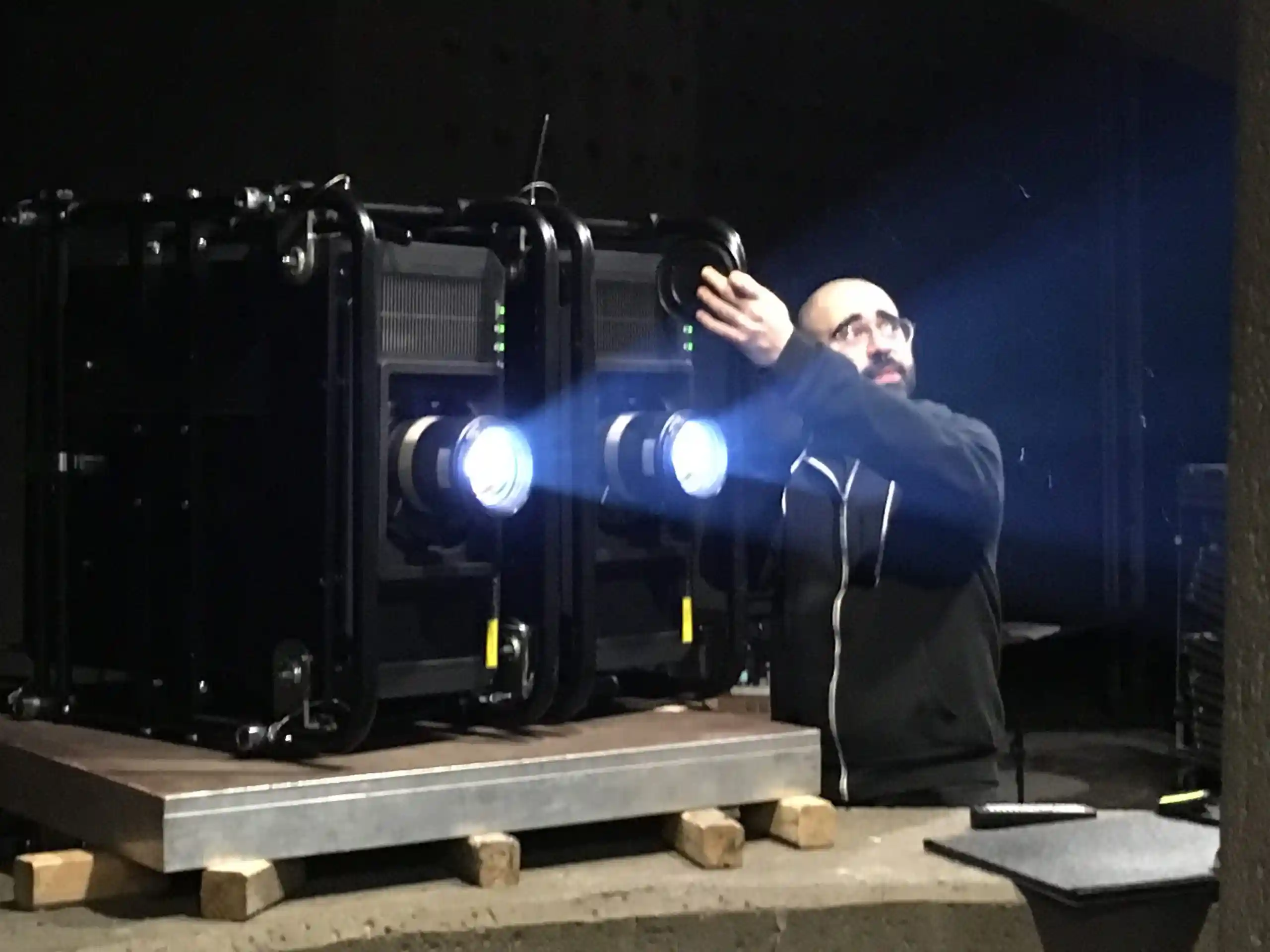 Emanuele Musca positioning the projectors for PHARUS